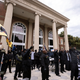 Dozens of Black Lives Matter and Black Panther protesters gather outside the Glynn County Courthouse where the trial of Travis McMichael, his father, Gregory McMichael, and William “Roddie” Bryan is held, Monday, Nov. 22, 2021, in Brunswick, Ga. The three men charged with the February 2020 slaying of 25-year-old Ahmaud Arbery.